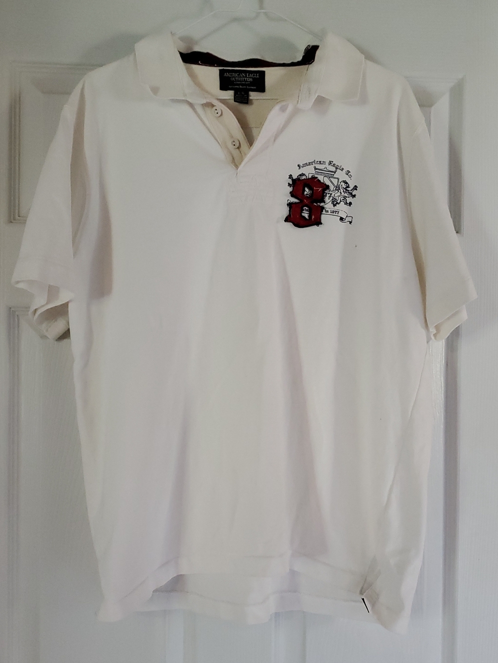 American Eagle Outfitters White Polo with Embroidered Crest